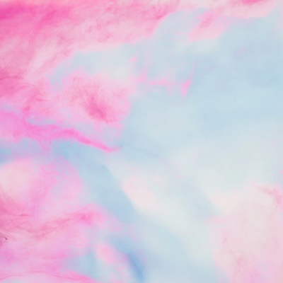 Abstract image of pink, light blue and white coloured clouds.